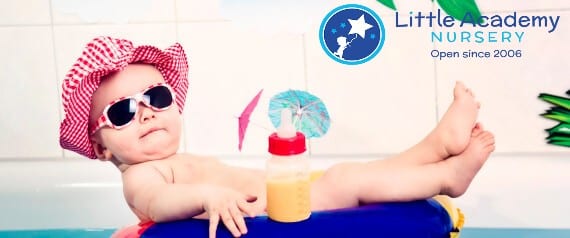 child enjoying his milk - Little Academy Nursery